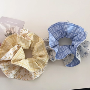 Floral and plaid scrunchies in yellow and blue, soft fabric ties for ponytails