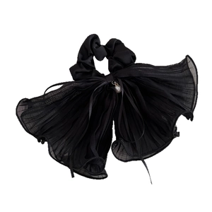 Black ruffled chiffon bow hair scrunchie with layered fabric and pearl charm detail