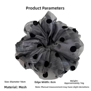 Detail view of gray mesh polka dot scrunchie showing 18cm diameter and 8cm width