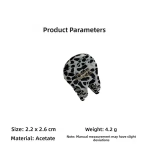 Mini acetate hair claw clip with zebra pattern showing 2.2x2.6cm size and 4.2g weight