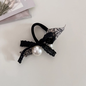 Elegant floral lace bow hair tie with a large faux pearl bead on white background