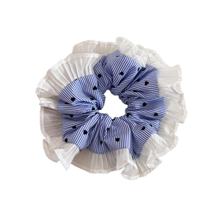 Blue striped scrunchie with heart print and white pleated trim for stylish hair styling
