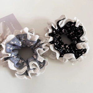 Floral print scrunchies with double-layer lace trim in misty blue and classic black colors