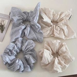 Set of four cotton linen floral embroidered scrunchies with long ribbon bow in blue and cream