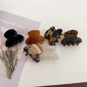 Set of 6 small French acetate hair claws in various patterns like marble and tortoiseshell