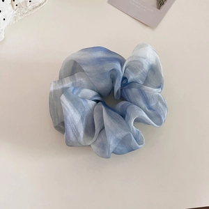 Ink marble pattern organza hair scrunchie with soft blue and white gradient texture