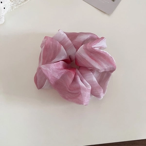 Detail of pink and white gradient ink-wash organza oversized scrunchie hair tie