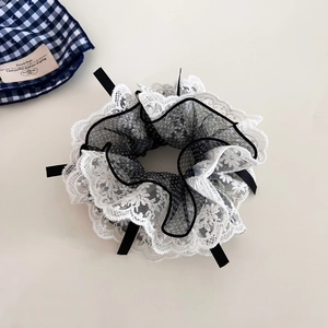 French vintage four-layer lace polka dot bow scrunchie in elegant black and white