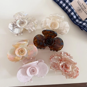 Set of 6 French style acetate orchid hair claws in assorted marbled and solid colors