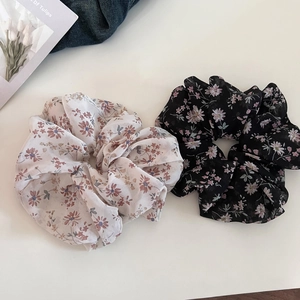 Floral chiffon hair scrunchies in black and cream white for versatile hairstyles