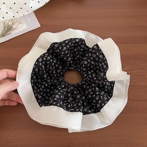 Elegant black and white floral large scrunchie with layered chiffon ruffle details