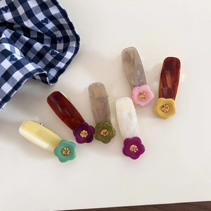 Set of six colorful acetate floral hair clips with rhinestones and vintage water drop design
