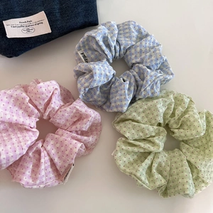 Three-piece set of sweet checkered and polka dot scrunchies in pink, blue, and green colors