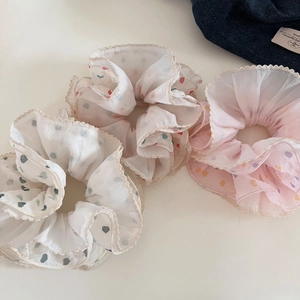 Set of three chiffon scrunchies with heart patterns and elegant lace trim details