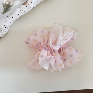 Pink chiffon scrunchie with heart patterns and elegant lace trim for a sweet look