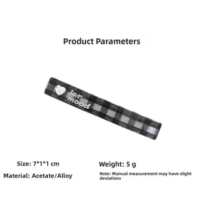 Detail view of checkerboard hair clip showing 7x1x1cm dimensions and acetate alloy material