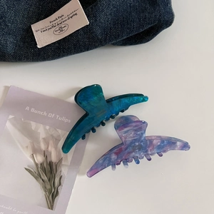 Set of two vintage marble pattern acetate hair claws in deep green and purple mix