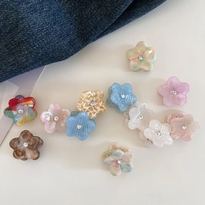 Mini acetate flower hair claws with marble textures and crystal center for women