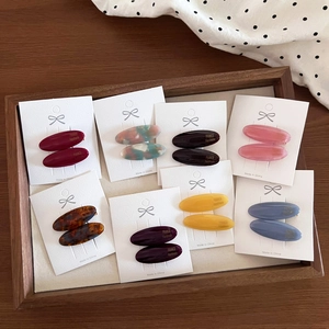Detailed set of 8 pairs of vintage oval acetate hair clips in various chic marble colors