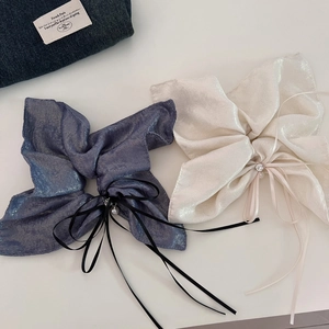 Elegant shimmer bow hair scrunchies in blue and white with pearls and long ribbons