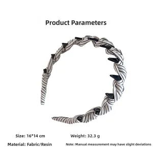 Detailed view of striped fabric headband with resin teeth and dimensions 16x14cm