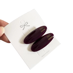 French retro oval acetate hair clips in deep burgundy with gold handmade lettering