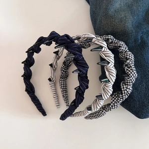 Set of four retro polka dot and striped fabric twist headbands with non-slip teeth design