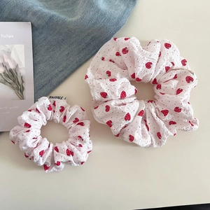 Set of two strawberry print scrunchies in white seersucker fabric for women hair styling