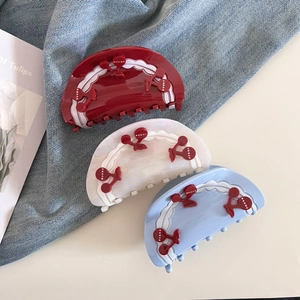 Sweet cherry pattern acetate hair claws in red, white and blue for half-up hairstyles