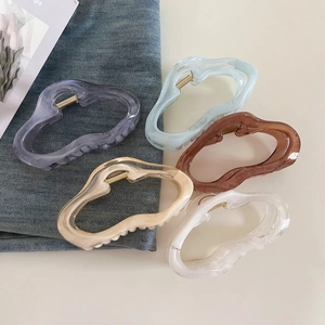 Set of large jelly color cloud hair claws in marble acetate for elegant updo hairstyles