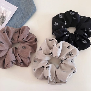 Three-piece vintage rose floral print scrunchies set in black, coffee, and beige fabrics