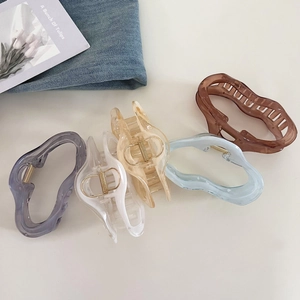 Set of 5 wave-shaped cloud hair claws in jelly colors like grey, blue, and yellow