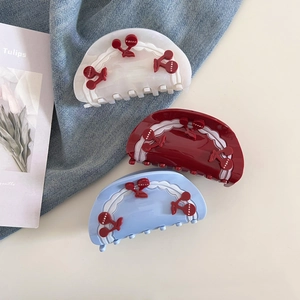 Sweet cherry acetate hair claw clips in white, wine red, and light blue with wave edges