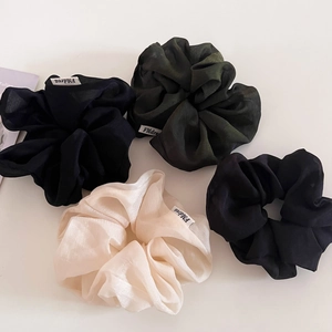 Set of four textured chiffon scrunchies in black, green, navy blue, and cream white colors