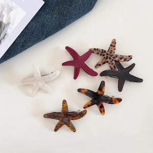 Set of six colorful starfish hair clips in acetate finish with metal spring clips