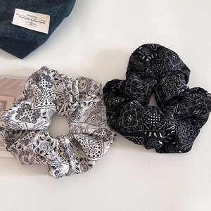 Set of two vintage paisley print scrunchies in black and white bohemian fabric style