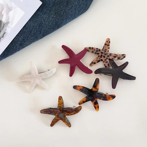 Retro acetate starfish hair clip set in pearl white and tortoiseshell patterns with metal spring