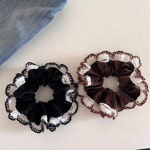 Elegant set of black and brown velvet scrunchies with white lace edges for vintage hairstyles
