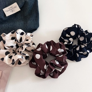 Three-piece set of retro polka dot scrunchies in cream brown and navy blue chiffon