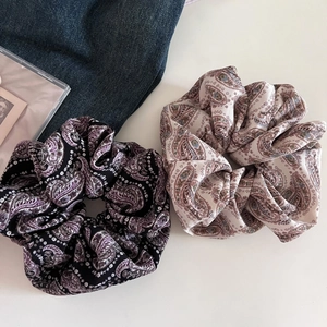 Set of two vintage paisley print scrunchies in purple and beige chiffon fabric