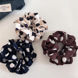 Three-pack vintage polka dot scrunchies in brown, blue and beige with woven label