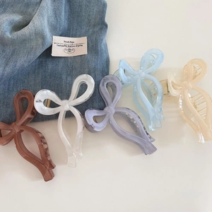 Detailed set of five pastel bow claw clips in coffee, pearl white, purple, blue and apricot