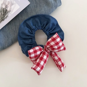Vintage denim hair scrunchie with red plaid bow and gold metal detail for ponytails