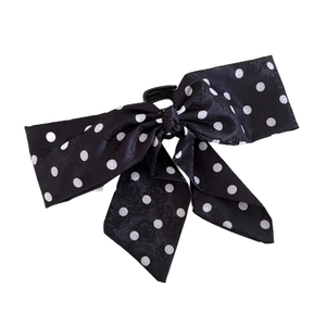 Elegant black and white polka dot ribbon bow hair claw clip for a chic hairstyle