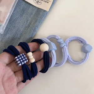 Sweet Korean high-elasticity cream-colored ponytail hair ties with cute resin charms