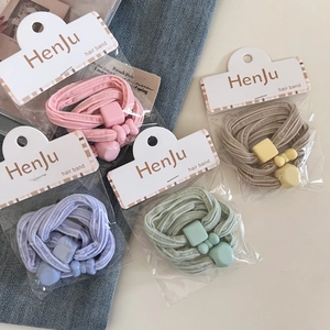 Three-pack sweet elastic hair ties in pastel colors with decorative bow and square charms