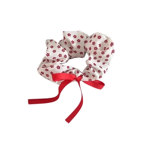 Floral print scrunchie with a bright red satin bow for women sweet ponytail accessory