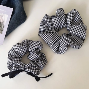 Classic black and white houndstooth hair scrunchies set with a cute ribbon bow