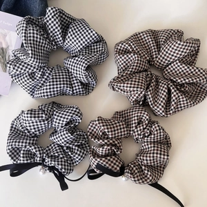 Set of 4 checkered hair scrunchies with satin bows and faux pearl pendant detail