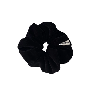 Elegant black velvet scrunchie with a vintage oversized pleated design and woven label